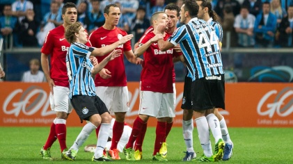 Players from Internacional and Grêmio go head-to-head on the pitch